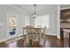 Bright breakfast nook with table and chairs at 505 Blue Mountain Rise, Canton, GA 30114