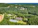 Aerial view of community, showing amenities like pool, tennis courts at 505 Blue Mountain Rise, Canton, GA 30114