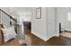 Inviting entryway with hardwood floors and bench at 505 Blue Mountain Rise, Canton, GA 30114