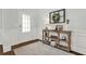 Bright foyer with wood flooring, console table and wreath at 505 Blue Mountain Rise, Canton, GA 30114