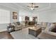 Open living room with a cozy fireplace at 505 Blue Mountain Rise, Canton, GA 30114