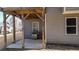 Covered patio area with built in grill at 505 Blue Mountain Rise, Canton, GA 30114