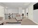 Upstairs sitting area with a chaise lounge and view of the lower level at 505 Blue Mountain Rise, Canton, GA 30114