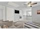 Upstairs sitting area with ceiling fan and view of the lower level at 505 Blue Mountain Rise, Canton, GA 30114