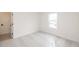 Bright bedroom with new carpet and large window at 488 Broom Dr, Cumming, GA 30040
