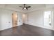 Spacious main bedroom with hardwood floors and en-suite bathroom at 488 Broom Dr, Cumming, GA 30040