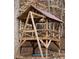 Backyard with covered playset featuring a wooden beam construction and a swing at 213 Moore Valley Way, Canton, GA 30115