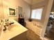 Bright primary bath with large soaking tub, vanity and natural light at 213 Moore Valley Way, Canton, GA 30115