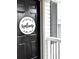 Black front door with a round welcome sign at 213 Moore Valley Way, Canton, GA 30115