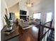 Spacious living room with hardwood floors, fireplace, and vaulted ceiling at 213 Moore Valley Way, Canton, GA 30115