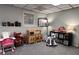 playroom features fun furniture, toys, storage, and a large window providing natural light at 213 Moore Valley Way, Canton, GA 30115
