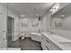 Modern bathroom with soaking tub, double vanity, and walk-in shower at 260 18Th Nw St # 10203, Atlanta, GA 30363