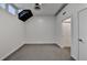 Spacious bedroom with gray carpet, and access to laundry and bathroom at 260 18Th Nw St # 10203, Atlanta, GA 30363