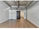 Spacious bedroom with hardwood floors and exposed ductwork at 260 18Th Nw St # 10203, Atlanta, GA 30363