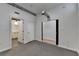 Bright bedroom with neutral wall color, carpet, and access to bathroom at 260 18Th Nw St # 10203, Atlanta, GA 30363