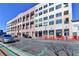 Modern building exterior with street-level retail and residential units above at 260 18Th Nw St # 10203, Atlanta, GA 30363