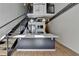 Modern kitchen with island, stainless steel appliances, and white cabinets at 260 18Th Nw St # 10203, Atlanta, GA 30363