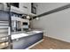 Modern kitchen with island, stainless steel appliances, and white cabinets at 260 18Th Nw St # 10203, Atlanta, GA 30363