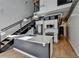 Modern kitchen with island, stainless steel appliances, and white cabinets at 260 18Th Nw St # 10203, Atlanta, GA 30363