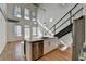 Modern kitchen with island, stainless steel appliances, and open layout at 260 18Th Nw St # 10203, Atlanta, GA 30363