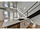 Modern kitchen with island, stainless steel appliances, and white cabinets at 260 18Th Nw St # 10203, Atlanta, GA 30363