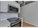 Modern kitchen with stainless steel appliances and white cabinets at 260 18Th Nw St # 10203, Atlanta, GA 30363