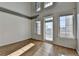 Living room with hardwood floors and multiple windows at 260 18Th Nw St # 10203, Atlanta, GA 30363