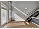 Living room with hardwood floors, large windows and balcony access at 260 18Th Nw St # 10203, Atlanta, GA 30363