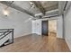Loft bedroom with barn door to bathroom at 260 18Th Nw St # 10203, Atlanta, GA 30363