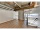 Loft area with exposed beams and hardwood floors at 260 18Th Nw St # 10203, Atlanta, GA 30363