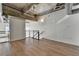 Loft bedroom with hardwood floors and exposed beams at 260 18Th Nw St # 10203, Atlanta, GA 30363