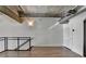 Loft area with hardwood floors and exposed beams at 260 18Th Nw St # 10203, Atlanta, GA 30363