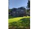 Two-story house with deck and fenced backyard at 205 Glenbrook Ln, Canton, GA 30115