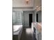 Luxurious bathroom with double vanity, soaking tub, and glass shower at 205 Glenbrook Ln, Canton, GA 30115