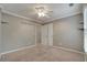 Bedroom with plush carpet, two windows and crown molding at 205 Glenbrook Ln, Canton, GA 30115
