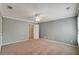 Bedroom featuring plush carpet, window and neutral paint at 205 Glenbrook Ln, Canton, GA 30115
