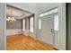 Inviting foyer with hardwood floors, a chandelier, and a view into the adjacent living space at 205 Glenbrook Ln, Canton, GA 30115