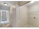 Hallway featuring neutral paint, updated lights, carpet, and a laundry room with a utility sink hookup at 205 Glenbrook Ln, Canton, GA 30115