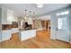 Bright kitchen featuring stainless steel appliances, granite countertops, and hardwood flooring at 205 Glenbrook Ln, Canton, GA 30115