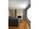 Living room with fireplace and hardwood floors at 205 Glenbrook Ln, Canton, GA 30115