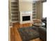 Living room with fireplace and built-in shelving at 205 Glenbrook Ln, Canton, GA 30115