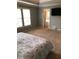 Main bedroom with ensuite bathroom and a large window at 205 Glenbrook Ln, Canton, GA 30115