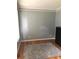 Bright office space with hardwood floors and neutral gray walls at 205 Glenbrook Ln, Canton, GA 30115