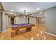 Billiards room featuring a full-size pool table, recessed lights, and hardwood flooring at 205 Glenbrook Ln, Canton, GA 30115