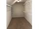 Large walk-in closet with ample shelving and hanging space at 205 Glenbrook Ln, Canton, GA 30115