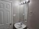 Simple bathroom with white sink and vanity at 3445 Mell Pl, Clarkston, GA 30021