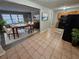 Open concept dining area with kitchen and living room views at 3445 Mell Pl, Clarkston, GA 30021