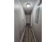 Long hallway with light gray walls and wood-look floors at 3445 Mell Pl, Clarkston, GA 30021