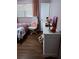 Bedroom with hardwood floors and a comfortable workspace at 2479 Kingsland Dr, Dunwoody, GA 30360