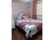 Charming bedroom with hardwood floors and stylish decor at 2479 Kingsland Dr, Dunwoody, GA 30360